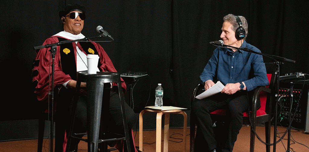 Stevie Wonder being interviewed by Dennis Elsas at WFUV